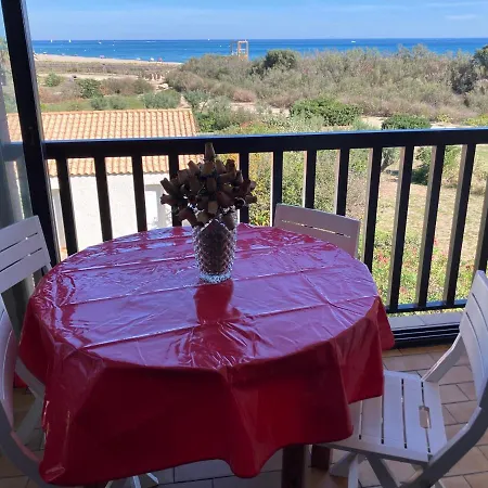 Seaside Serenity: Beachfront With Pool And Ocean Views Apartment